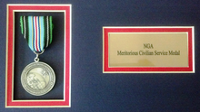 NGA's Meritorious Civilian Service Medal as awarded to honorees. NGA Meritorious Civilian Service Medal.png