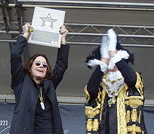 Osbourne in 2007 with the Mayor of Birmingham (right) in his home city Ozzy star.JPG