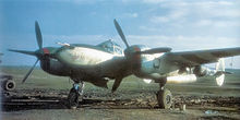 P-38 of the 370th Fighter Group on a wartime advanced landing strip P-38-370fg-1945.jpg