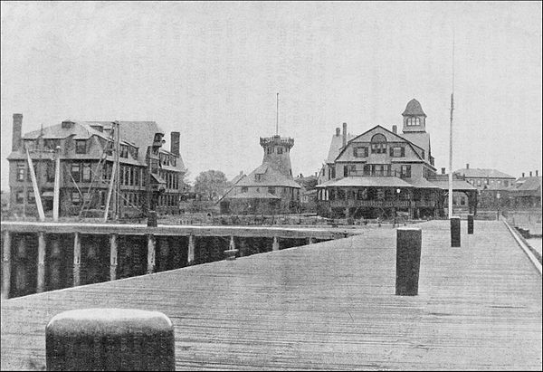 Fish Commission buildings and docks at Woods Hole, Massachusetts, ca. 1892.