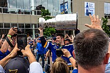 Patrick Maroon with the Stanley Cup at the Blues' victory parade following the 2019 Stanley Cup Finals. Patrick Maroon Stanley Cup 2019.jpg