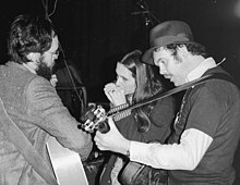 Dave Peabody (at R) jams with Magpie (duo) (U.K. and U.S. folk/acoustic performers), Norwich Festival 1981 Peabody-Magpie-Norwich-81.jpg