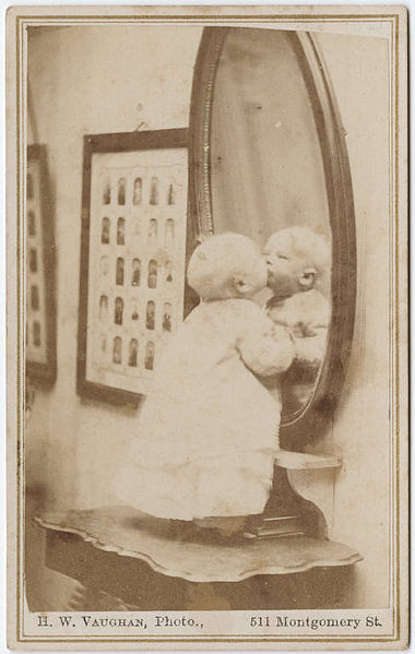 File:Photograph of a baby standing in front of a mirror.jpg