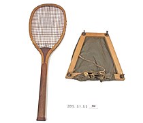Wooden tennis racquet.