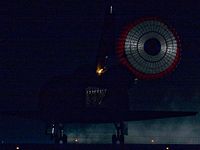 Endeavour rolls out after touchdown. The yellow flame is from the shuttle's APUs and is clearly visible in the pitch black night. Space Shuttles did not have anti collision lights, navigation lights, or landing lights STS-123 Landing.jpg