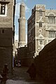 Houses in old Sana'a. Ibex and Bull were sacred animals in ancient Yemen. Yemenis put Ibex or Bull horns at top of houses to protect from evil eyes.[49]