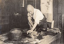 Sharpener working on Japanese swords (1915 by Elstner Hilton).jpg