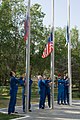 Soyuz MS-06 crew members with their backups raise flags.jpg