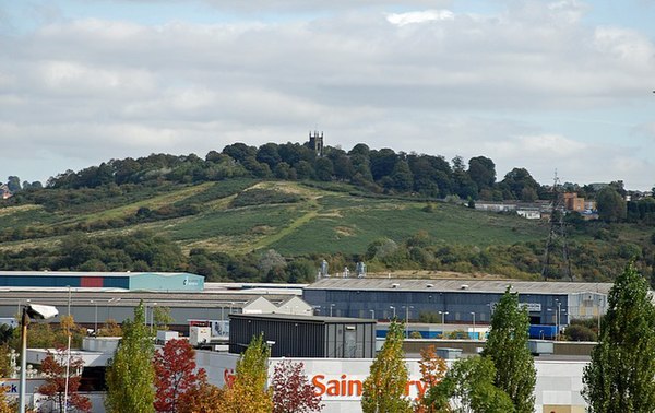 View of St. Andrew's Church, Netherton, with nearby Merry Hill Centre in the foreground