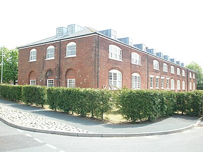 Cavalry barracks, Christchurch, Dorset, 1795: officers' accommodation in the end blocks, ground-floor stables with men's accommodation over.