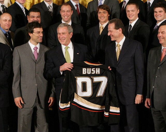 U.S. President George W. Bush is presented with a Ducks jersey during a White House ceremony in honor of the team's championship season.