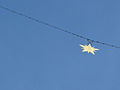 Close-up of the golden star hanging over Moustiers-Sainte-Marie