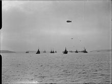 A British convoy, with balloon protection, leaving the port of Milford Haven during WW2. THE ROYAL NAVY DURING THE SECOND WORLD WAR.jpg