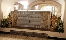 Grave of John Paul I in the Vatican Grottoes, with its plaque updated after his beatification on 4 September 2022 TombaBeatoGiovanniPaoloI2022.jpg