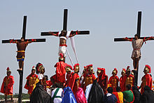 Good Friday observance in Pampanga Trio on crosses.jpg