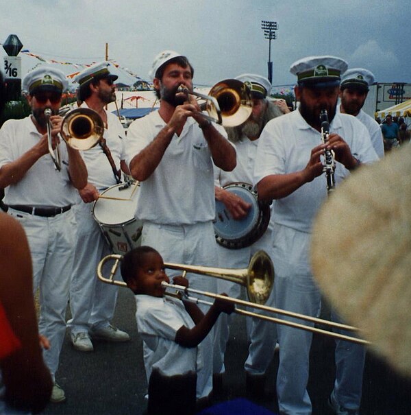 Trombone Shorty at age five, with the Carlsberg Brass Band, New Orleans Jazz & Heritage Festival, 1991