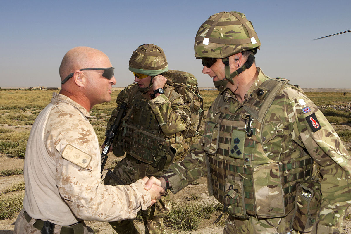 File:U.S. Marine Corps Maj. Earlie Walker, executive officer, 2nd Light  Armored Reconnaissance Battalion (Forward), left, greets British Army Brig.  Nick Welch, deputy commander, Regional Command (Southwest) (RC SW)  110815-M-LU710-004.jpg - Wikimedia