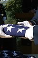 An Air Force honor guard folds the American flag after presenting it to the families of the first veterans buried at Miramar National Cemetery aboard Marine Corps Air Station Miramar, Calif., Nov. 22. The new facility covers 300 acres and is large enough to host burials for the next 60 years.