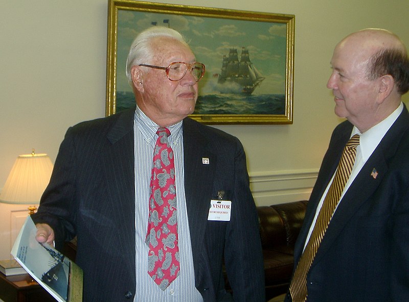 File:US Navy 030404-N-3399W-001 Former Cleveland Indian and National Baseball Hall of Famer Bob Feller shows the Honorable H.T. Johnson, acting Secretary of the Navy, a photo of USS Alabama, the ship on which he served for 4 years d.jpg