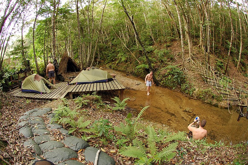 File:US Navy 050312-N-5781F-019 Sailors assigned to Explosive Ordnance Disposal Mobile Unit Five (EODMU-5), wash off in a creek after a full day of jungle warfare training exercises.jpg