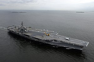 US Navy 060526-N-8591H-164 USS Kitty Hawk (CV 63) departs Yokosuka, Japan, to conduct sea trials in the Western Pacific Ocean.jpg