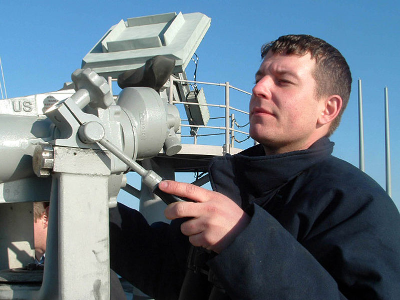 File:US Navy 080220-N-5180F-016 Seaman Joshua Thompson, of Seattle, Wash., peers through the 'big eyes' while standing watch topside aboard the amphibious assault ship USS Nassau (LHA 4).jpg