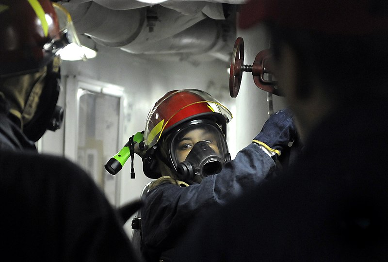 File:US Navy 091009-N-7280V-129 Information Systems Technician 3rd Class Jonetta McCoy charges the hose during a flying squad drill aboard the amphibious command ship USS Blue Ridge (LCC 19).jpg
