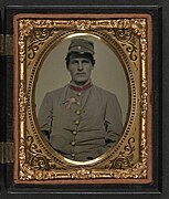 Unidentified soldier in Confederate artillery jacket with secession badge and artillery forage hat LOC 5228588931.jpg