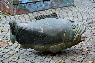sculptures boy, fish, frog