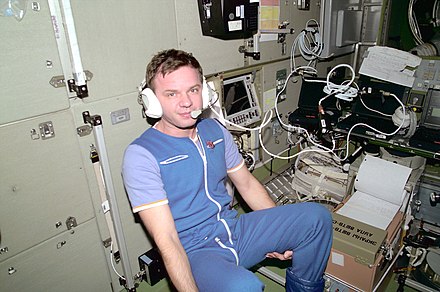 Yuri Gidzenko, in the Zvezda Service Module, communicates with ground controllers