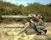 A U.S. Army soldier in 1964, with the first concept mock-up of Redstone Arsenal's proposed future HAW system (Heavy Antitank Weapon). The HAW ultimately resulted in the modern-day TOW.