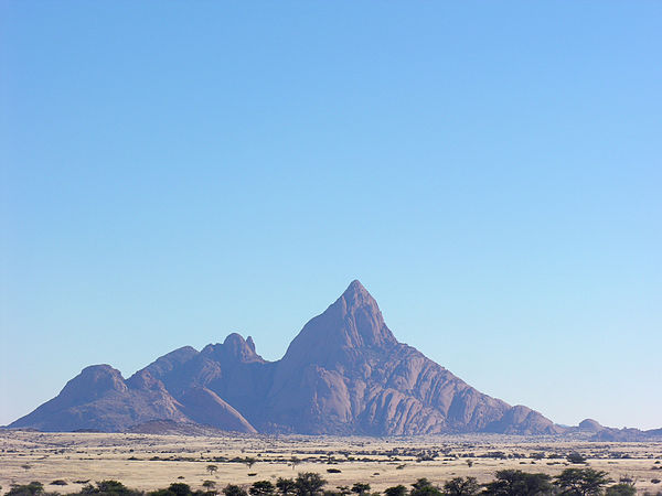 The Spitzkoppe of Namibia, a 670-metre (2,200 ft) granite peak formed by early Cretaceous rifting and magmatism.