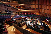 Comedians and audience at Wikimedia 2014 in the Barbican Hall, London.