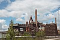 * Nomination: The Völklingen ironworks viewed from a nearby bridge. Some chimneys of the blast furnace and the ore elevator are visible. --DavidJRasp 22:31, 23 January 2022 (UTC) * * Review needed
