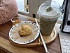 A scone and iced green tea from WhatCat Cafe