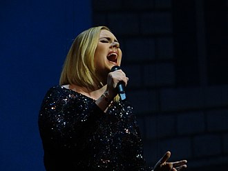 Adele singing at the Bridgestone Arena in Nashville, Tennessee during her Adele Live 2016 tour Adele 'Adele Live 2016' - Nashville DSC04668 (29780296314).jpg