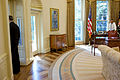 Barack Obama in the Oval Office, Phil Schiliro looks out the window.jpg
