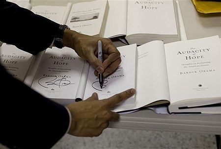 Barack Obama signs copies of The Audacity of Hope 2-9-09.jpg