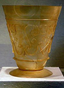 9-10th century beaker from Iran. Blown and relief-cut glass. New York Metropolitan Museum of Art. Beaker Iranian.JPG