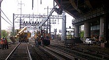 Metro-North crews work to rebuild tracks Bridgeport-20130520-00325 (8767973448) (cropped).jpg