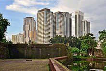 Skyline of Binondo, the central business district of the city of Manila, as seen from Fort Santiago