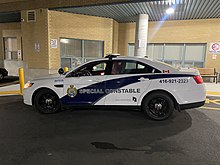 Service vehicle for the Toronto Community Housing's Community Safety Unit, a special constabulary authorized by the Toronto Police Services Board. CSU Marked Ford Taurus Police Interceptor.jpg