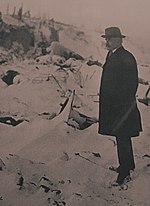 Borden surveying the ruins of the Halifax Explosion Canada's Prime Minister Robert Borden surveys the ruins of the Explosion (24793586598).jpg