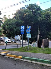 PR-719 north approaching PR-156 junction in downtown Barranquitas