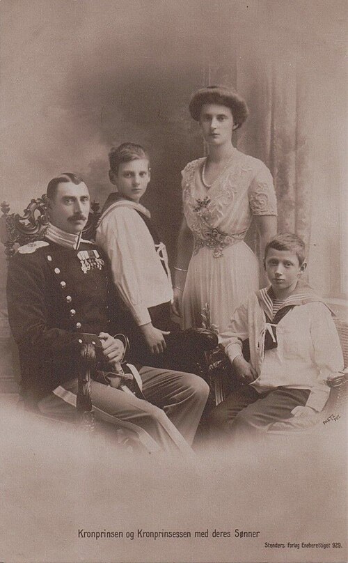 King Christian X, Queen Alexandrine and their two sons, Crown Prince Frederik and Prince Knud in 1912.