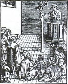 Hallowed be Thy Name by Lucas Cranach the Elder illustrates a Lutheran pastor preaching Christ crucified. During the Reformation and afterwards, many churches did not have pews, so people would stand or sit on the floor. The elderly might be given a chair or stool. Das Vaterunser 2 Lucas Cranach d A.jpg