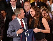 Taurasi with President George W. Bush at a White House ceremony for the national champion 2002-03 Connecticut Huskies. DianaTaurasiWhiteHouse.jpg