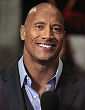 Dwayne Johnson joined the cast in Fast Five and headlined the first spin-off film. Dwayne Johnson 2, 2013.jpg