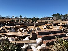 High-end EF3 damage to a home where two fatalities occurred in Grissettown, North Carolina. EF3 damage in the Ocean Ridge Plantation community 2021.jpg