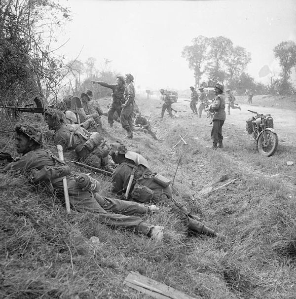 Men of the 1st Battalion, Welsh Guards, part of the 32nd Guards Brigade of the Guards Armoured Division, in action near Cagny, 19 July 1944